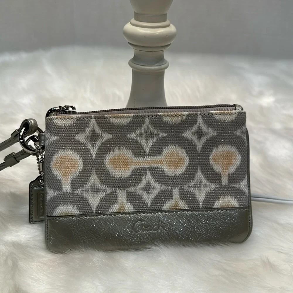 Coach, gray and pink cloth leather wristlet